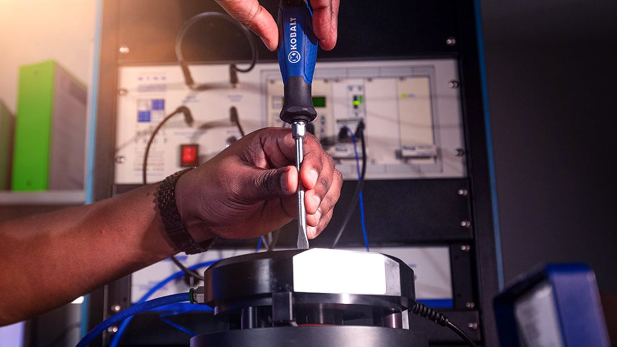 calibration service provider performing maintenance on lab equipment